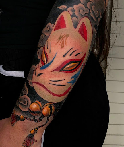 Explore color tattoo cover up ideas, creative tattoo ideas in Nashville, available at Titan Tattoo