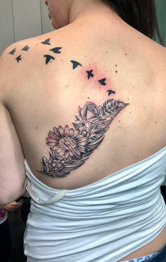Explore rose tattoo ideas, creative tattoo ideas in Meridian, available at Creative Pain Tattoo Studio