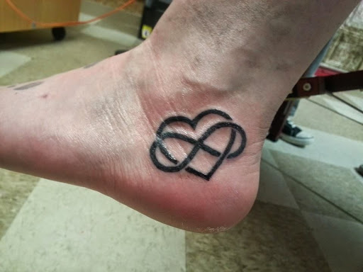 Explore cardinal tattoo ideas, creative tattoo ideas in La Crosse, available at La Crosse Tattoo