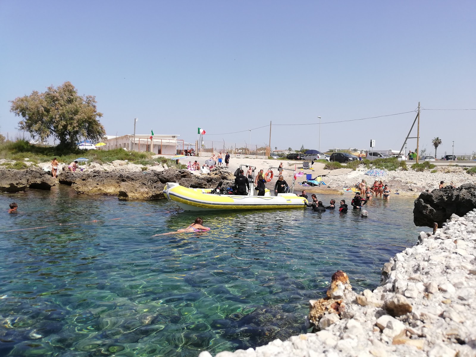 Fotografija Spiaggia di Posto Vecchio z modra čista voda površino