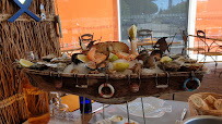 Plats et boissons du Restaurant de fruits de mer Aux Délices de la Mer à Le Grau-du-Roi - n°11