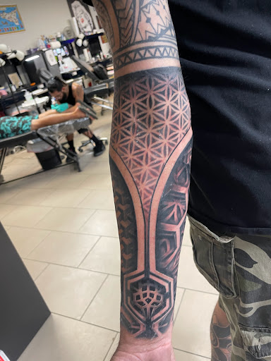 Explore tattoo ideas with crosses, creative tattoo ideas in Sarasota, available at SEVEN SINS Tattoo Studio