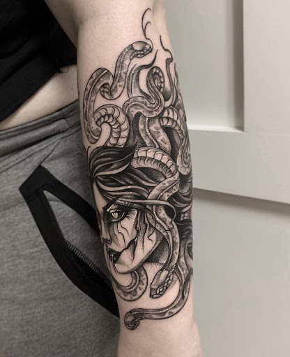 Explore fingerprint heart tattoo ideas, creative tattoo ideas in Seymour, available at Sacred Art Tattoo