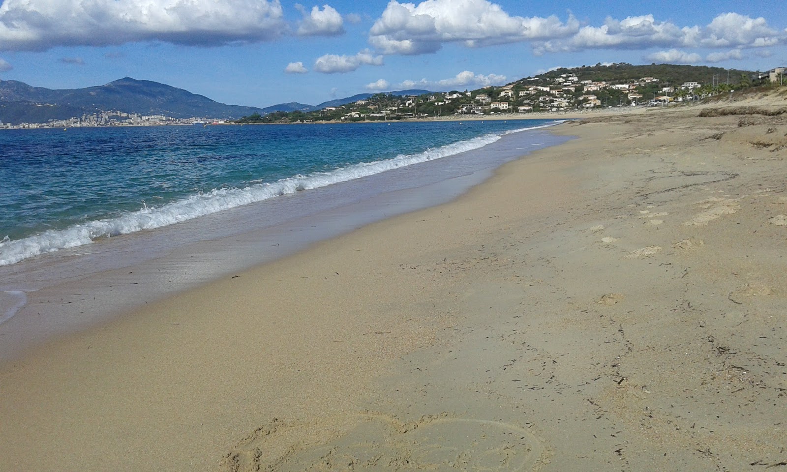 Foto av Agosta beach III med lång rak strand