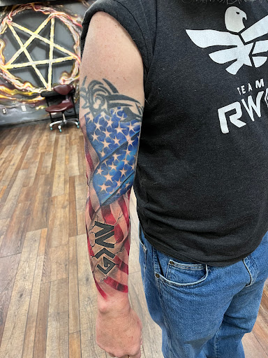 Explore cool sleeve tattoo ideas for guys, creative tattoo ideas in Clarksville, available at Dark Raine Tattoo