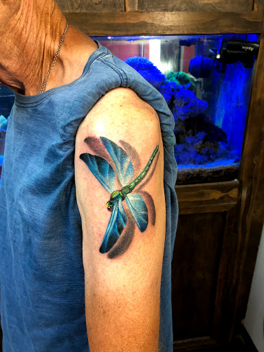 Explore charlie brown tattoo ideas, creative tattoo ideas in Kennewick, available at Gravity Tattoo