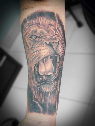 Explore good ideas for a cover up tattoo, creative tattoo ideas in Saint Petersburg, available at Edens Apple Tattoos and Piercings