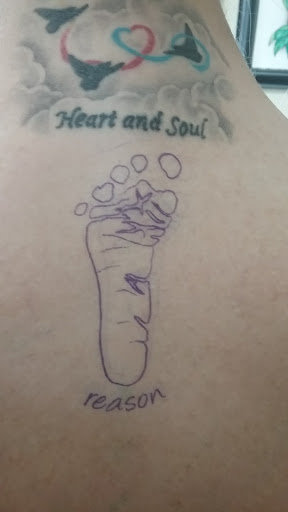 Tattoo Shop «Skinny Buddha Tattoo», reviews and photos, 203 S Monroe Ave, Green Bay, WI 54301, USA