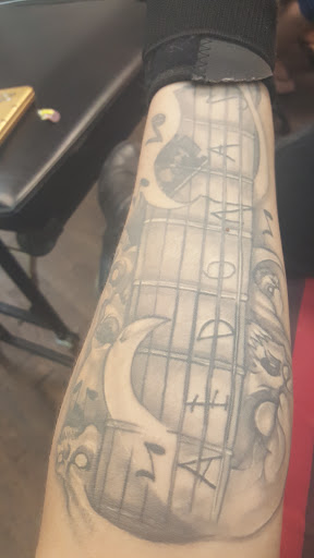 Explore down syndrome tattoo ideas, creative tattoo ideas in Albuquerque, available at Evil Emporium of Tattoos