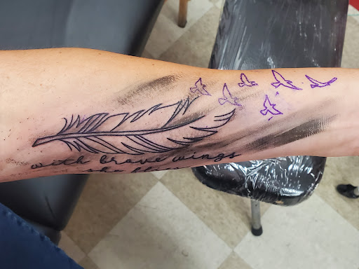 Tattoo Shop «Eye For An Eye Tattoo Parlor», reviews and photos, 1405 N Frazier St, Conroe, TX 77301, USA