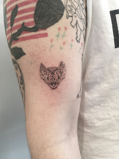 Explore lower back tattoo cover up ideas, creative tattoo ideas in Fairfield, available at Arrowhead Tattoo