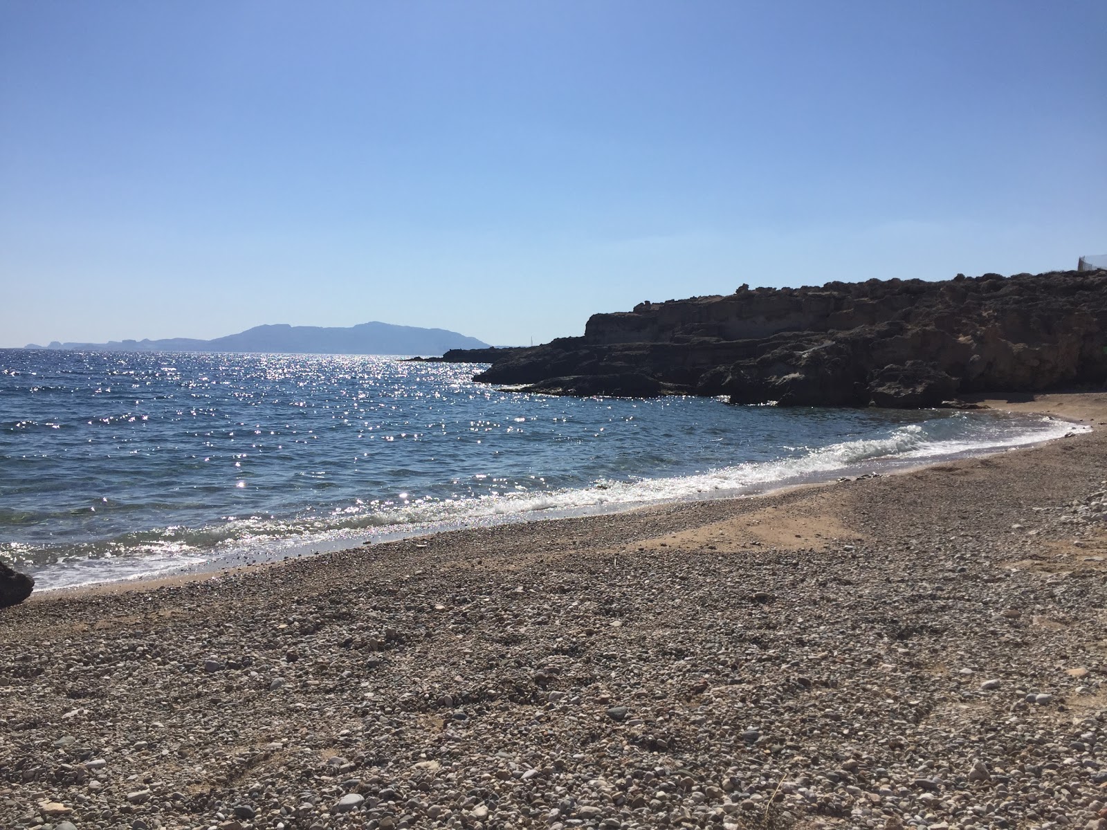 Foto van Agia Triada Strand met kleine baai