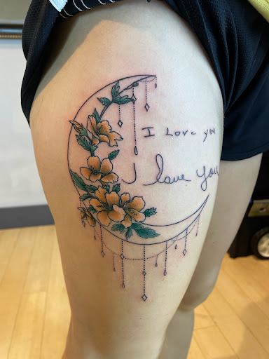 Explore belly tattoo ideas, creative tattoo ideas in Fort Wayne, available at Grade A Tattoos and Body Piercing