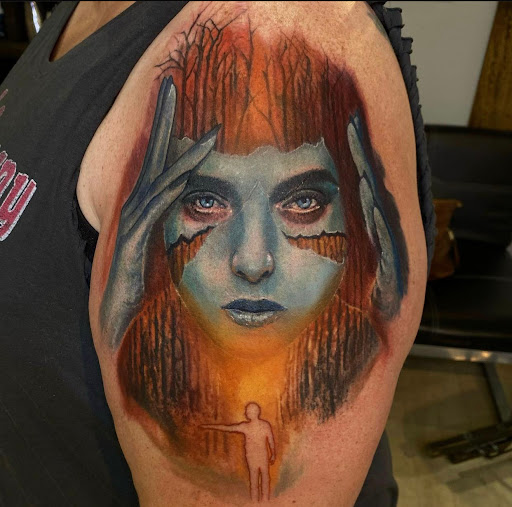 Explore tattoo ideas for womens back, creative tattoo ideas in Fort Wayne, available at Grade A Tattoos and Body Piercing