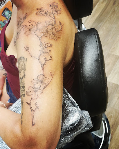 Explore lion tattoo ideas for females, creative tattoo ideas in Amelia, available at Stay Gold tattoo studio