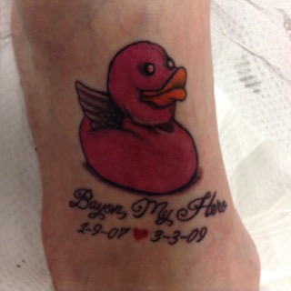 Find tattoo ideas for a mom for your next unique tattoo in Seymour at American Gypsy Tattoo Corp.