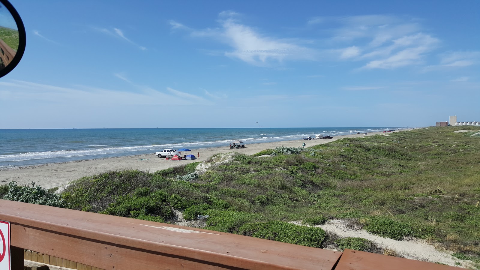 Photo of Gulf Waters beach with long straight shore