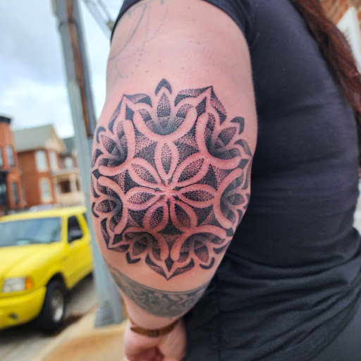 Explore superhero tattoo ideas, creative tattoo ideas in Galena, available at Emerald Buddha Tattoo