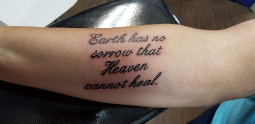 Explore watercolor flower tattoo ideas, creative tattoo ideas in Lubbock, available at Sinners & Saints Art Company