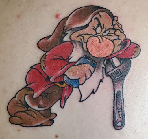 Explore red ink neck tattoo ideas, creative tattoo ideas in Spokane, available at Feel Good Ink