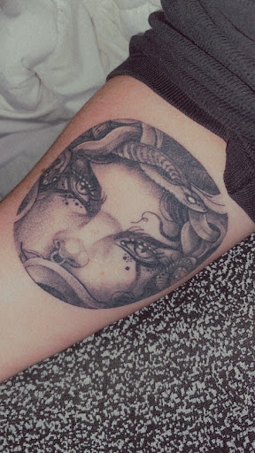 Explore kneecap tattoo ideas, creative tattoo ideas in Broxton, available at Seratonin Tattoo Parlor