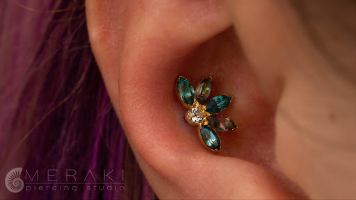 Explore tattoo ideas behind the ear tattoos, creative tattoo ideas in Stow, available at Meraki piercing studio