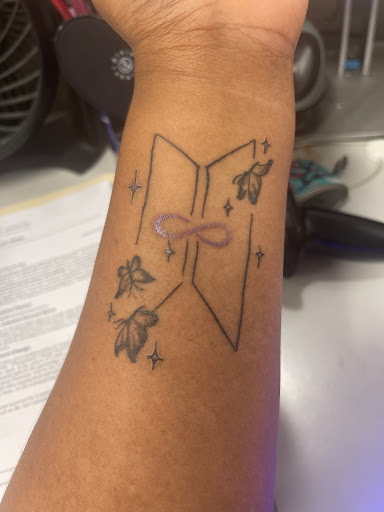 Explore back forearm tattoo ideas, creative tattoo ideas in Saint Paul, available at Iron Rhino Tattoo