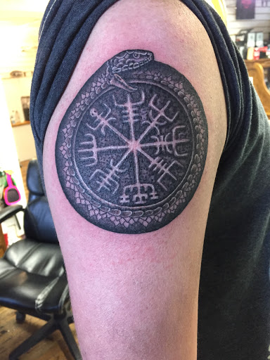 Explore tattoo ideas upper back, creative tattoo ideas in Eureka Springs, available at Sailors Luck Tattoo