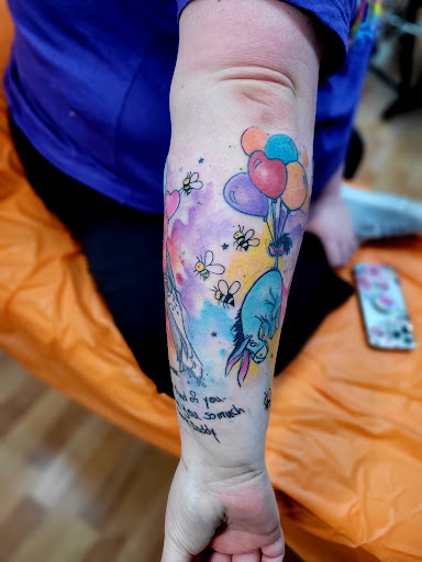 Explore flower bouquet tattoo ideas, creative tattoo ideas in Benton, available at Spectrum Tattoo