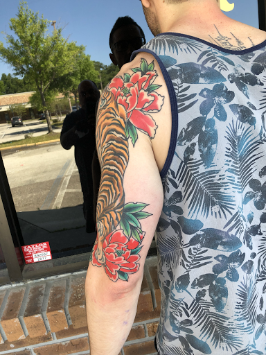 Explore tattoo cover up ideas for guys, creative tattoo ideas in Jacksonville, available at Idle Hands Tattoo Co.