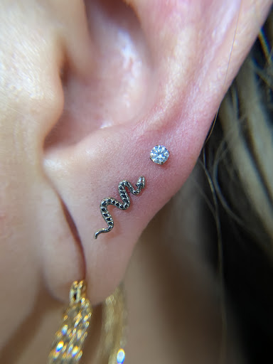 Explore shoulder tattoo ideas for men, creative tattoo ideas in Ypsilanti, available at Michigan Avenue Tattoo & Piercing