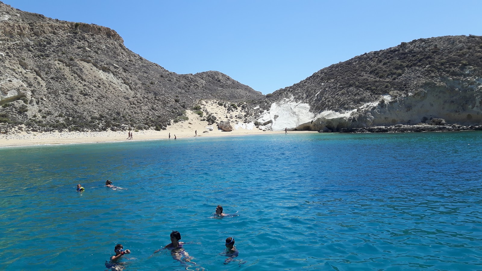 Photo of Chiliaderfia Beach with turquoise pure water surface