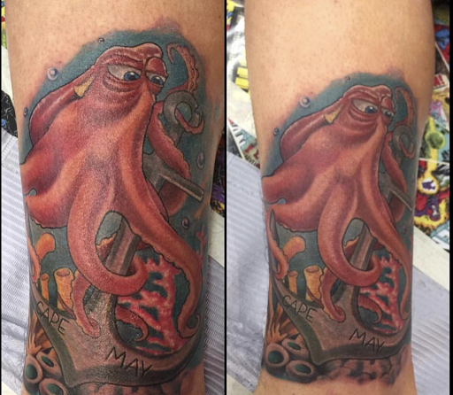 Explore spartan helmet tattoo ideas, creative tattoo ideas in White Plains, available at Addicted To Ink