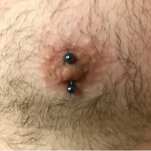 Explore snake tattoo ideas for females, creative tattoo ideas in Charleston, available at Exotic Impressions Body Piercing