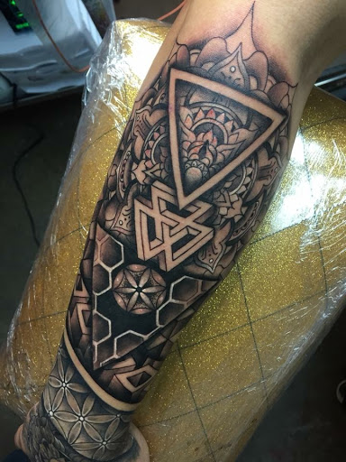 Explore tattoo ideas representing strength, creative tattoo ideas in Arlington, available at Urbans Tattoo & Piercing Studio