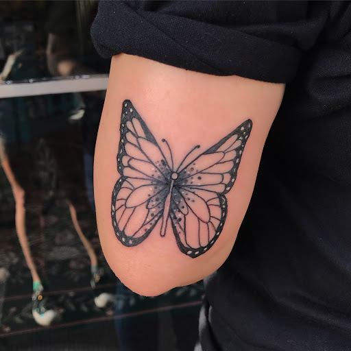 Explore arrow tattoo ideas for men, creative tattoo ideas in Savannah, available at Tramp Art Studios