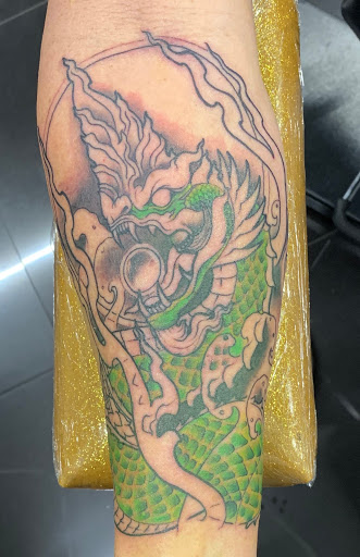 Explore tattoo flower ideas, creative tattoo ideas in Addison, available at Cat Tattoo