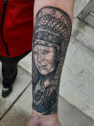 Explore hairdresser tattoo ideas, creative tattoo ideas in Lakeview, available at Backwoods Tattoo Studio