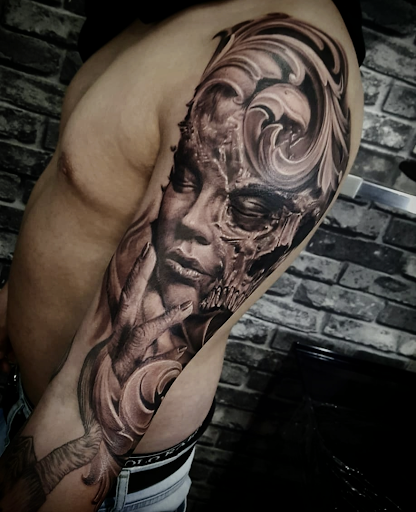 Explore upper chest tattoo ideas, creative tattoo ideas in Woodside, available at Fiction Tattoo Inc.