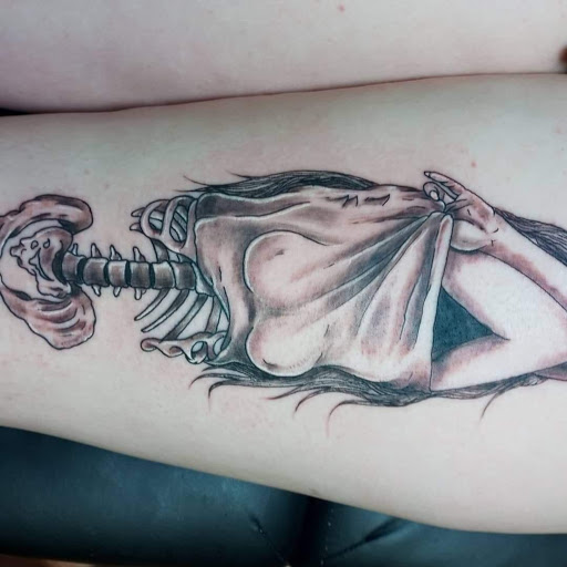 Explore tramp stamp tattoos ideas, creative tattoo ideas in Canon City, available at Royal Gorge Custom Tattoos & Piercings LLC