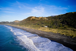 Photo of Half Moon Bay Beach and the settlement