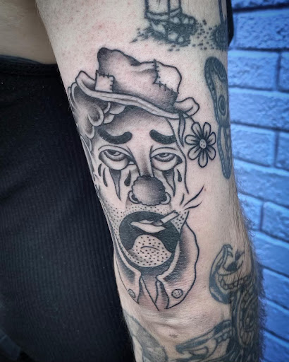 Explore lower leg tattoo ideas male, creative tattoo ideas in New Orleans, available at Downtown Tattoos and Piercing