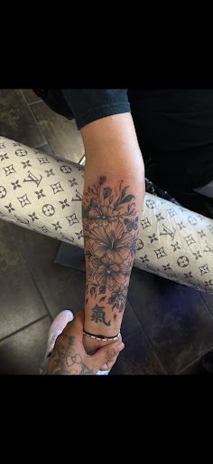 Explore men neck tattoo ideas, creative tattoo ideas in Sayville, available at Dark Timez Tattoo and Piercing