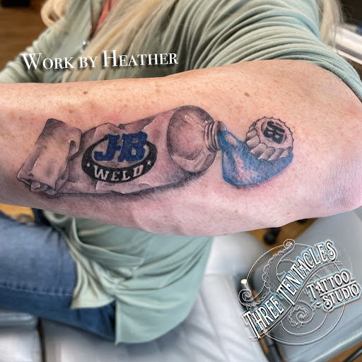 Explore last name back tattoo ideas, creative tattoo ideas in Hayward, available at Three Tentacles Tattoo Studio