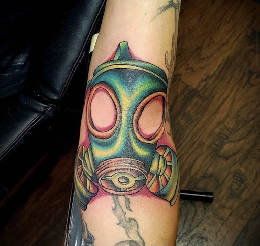 Explore hustle tattoo ideas, creative tattoo ideas in Alamosa, available at The Shop Tattoo & Comics