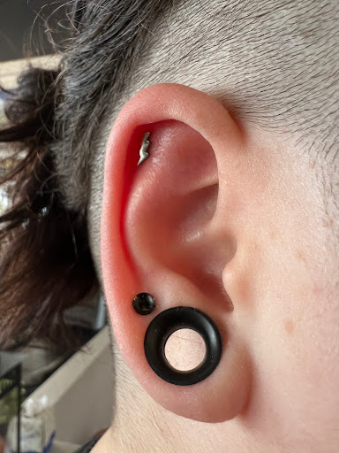 Explore cover up tattoo ideas for chest, creative tattoo ideas in Kissimmee, available at Fallen Heroes Tattoo & Piercing (Florida)