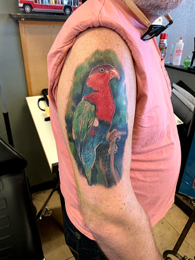 Explore wedding band tattoo ideas for him, creative tattoo ideas in Satellite Beach, available at Rocksteady Tattoo Company