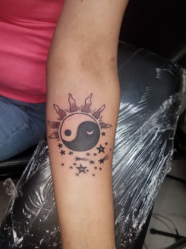 Explore dog collar tattoo ideas, creative tattoo ideas in Spencer, available at Ink Envy Tattoo And Body Piercing