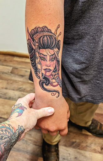 Explore forever tattoo ideas, creative tattoo ideas in Cornelia, available at Prismatic Pulse Tattoo