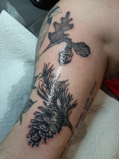 Explore godfather tattoo ideas, creative tattoo ideas in Lakeview, available at Backwoods Tattoo Studio